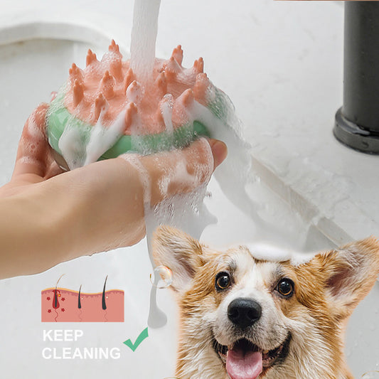 Dog being washed with a soap-dispensing pet bath brush