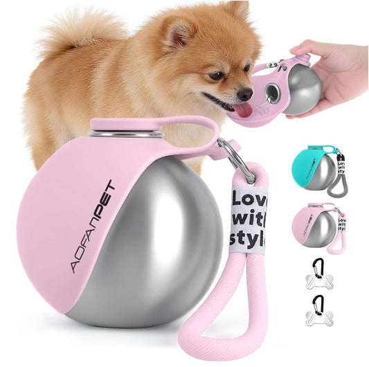 Small dog drinking from a pink round travel water bottle