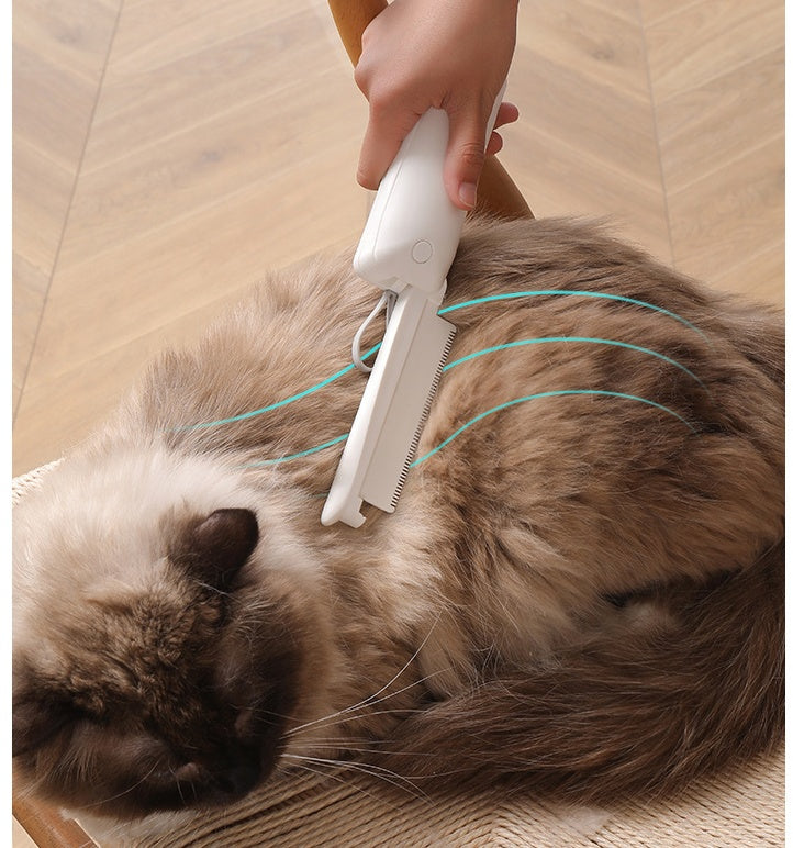 Folding grooming comb used on a cat