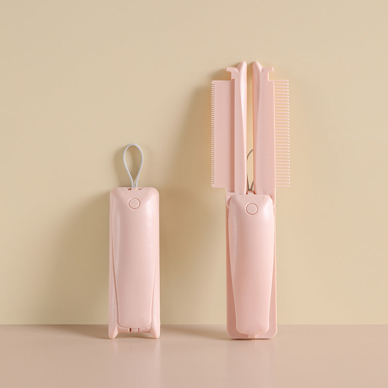 Pink folding pet grooming tool
