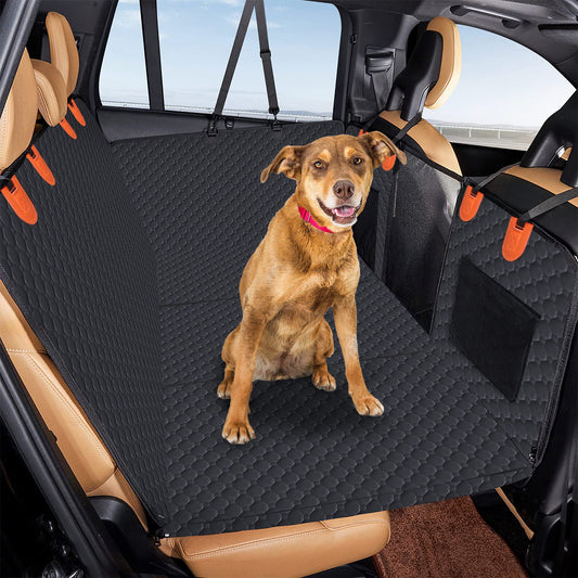 Dog resting on a full-coverage backseat car protector