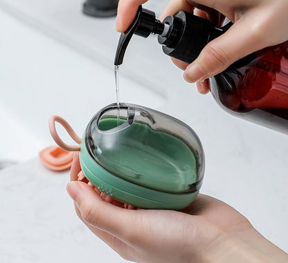 Filling the shampoo reservoir on a pet bath brush