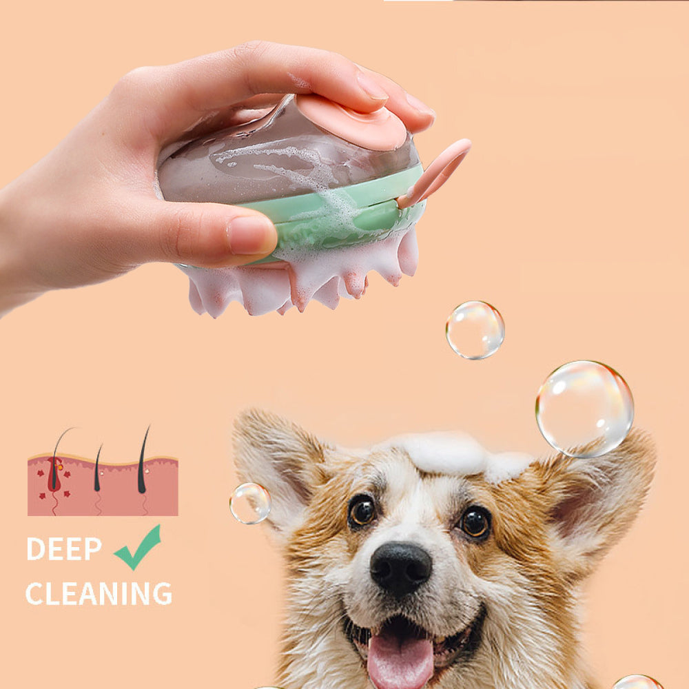 Hand holding a green shampoo-dispensing bath brush